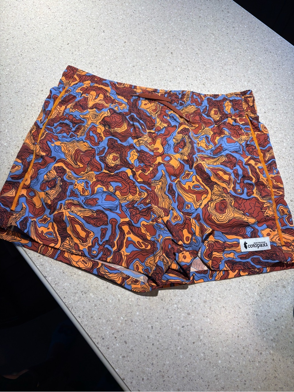 Cotopaxi Women’s Orange & Blue Printed Adventure Shorts worn once!